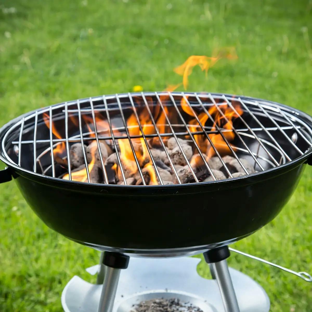 Charcoal grill in a backyard barbecue.