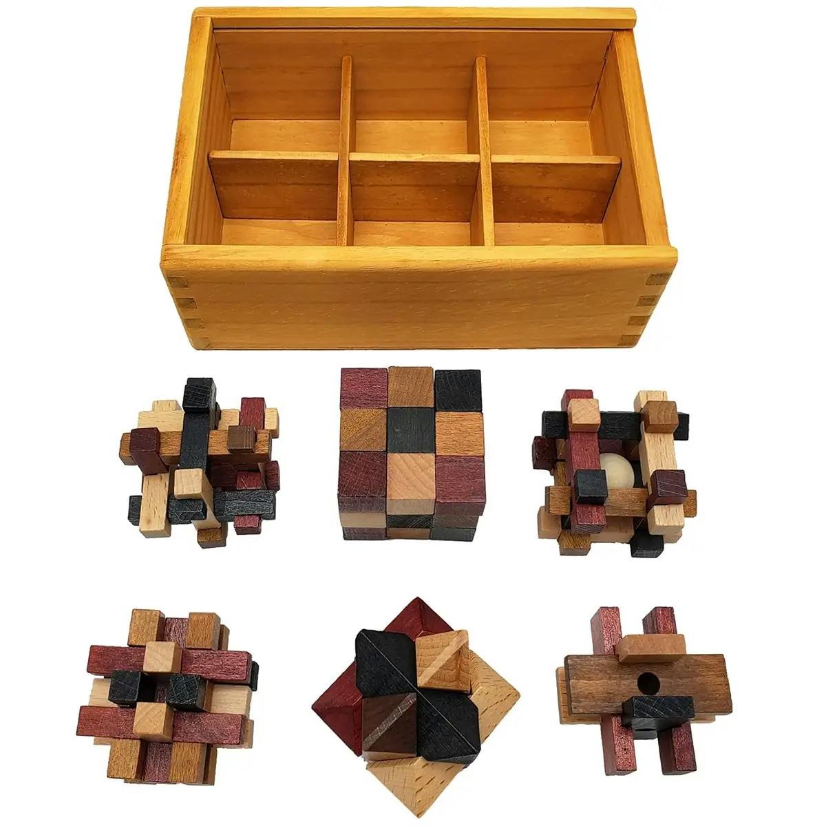 Six wooden 3D brain teaser puzzles and the wooden bog they arrive in.