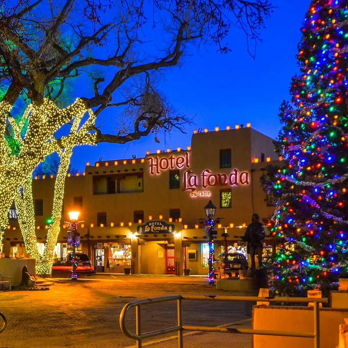 Beautiful holiday decorations at Taos, New Mexico Plaza with the famous La Fonda Hotel.