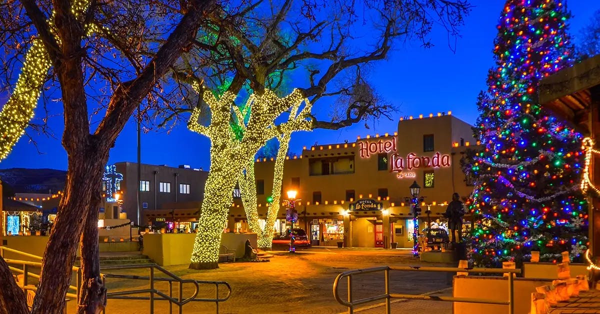 Beautiful holiday decorations at Taos, New Mexico Plaza with the famous La Fonda Hotel.